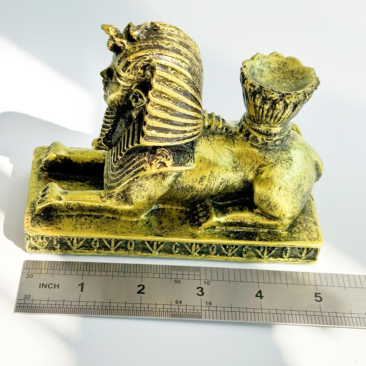 $13.5/1pcs Yellow sphinx crystal sphere base.