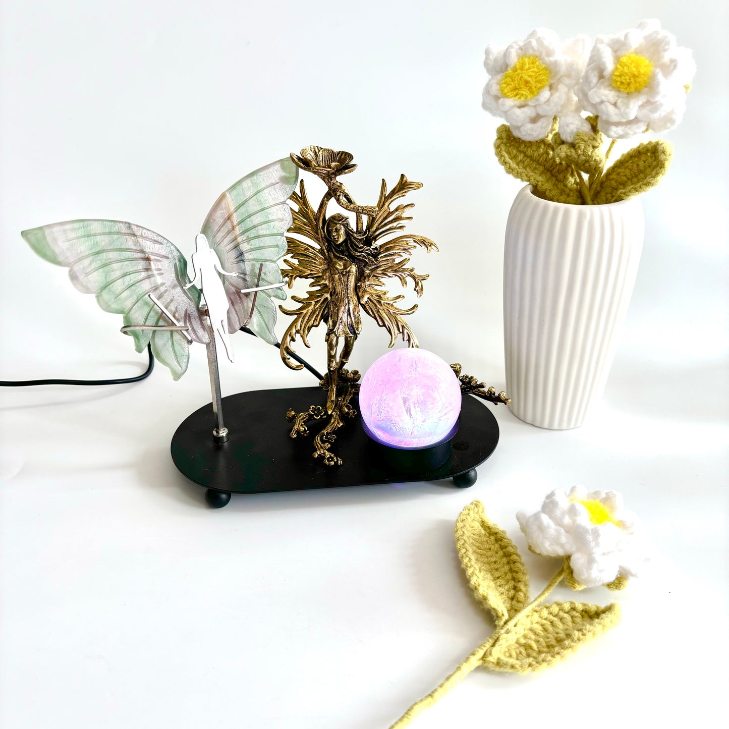 $24.3/1 pce  Golden fairy with wing light  crystal sphere base.