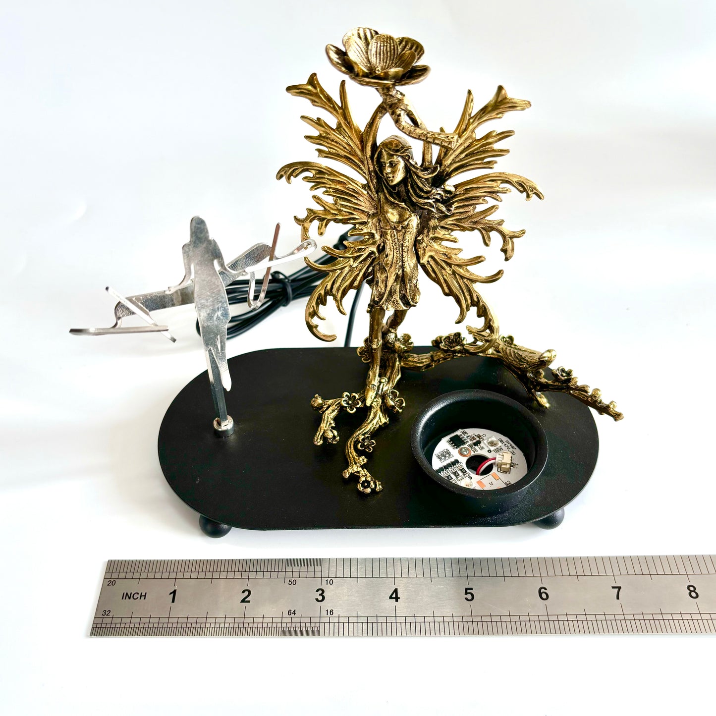 $24.3/1 pce  Golden fairy with wing light  crystal sphere base.