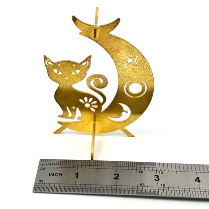 $4.8/1 pieza Gatito sentado en la base de la esfera de cristal lunar.